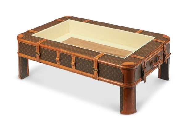 A low table made from vintage Louis Vuitton luggage. Please contact us for availability.