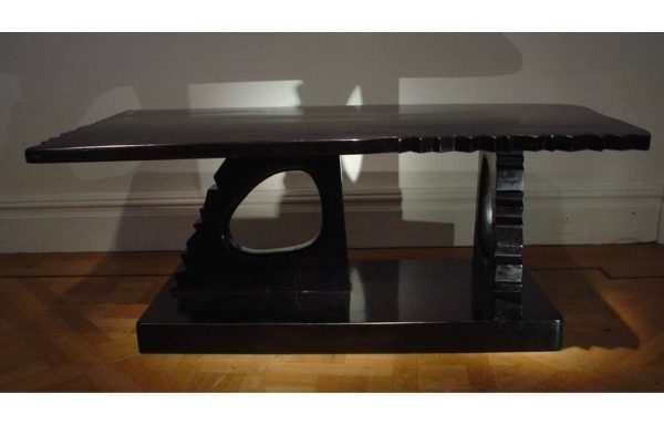 A sold ebony coffee table in the manner of Alexandre Noll. French. Circa 1950’s.