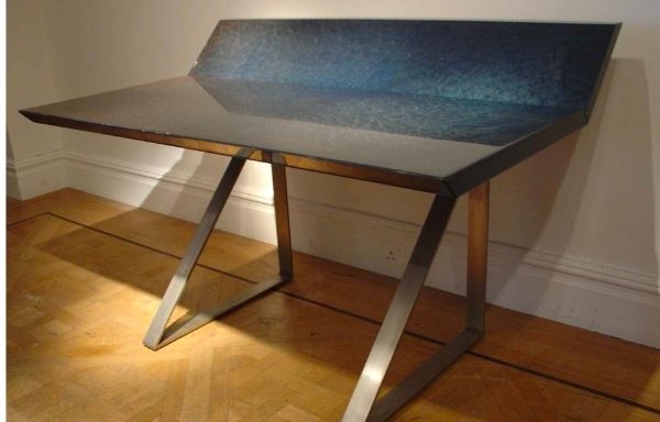 A steel and blue lacquer desk. Italian. Circa 1970.