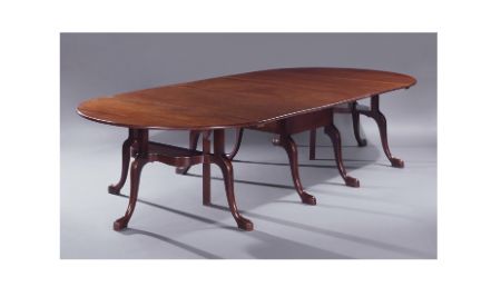 A superb and rare George II mahogany dining table.